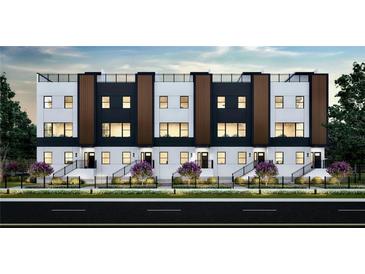 Modern townhouses with sleek design, private entrances, and landscaped yards at 2100 4Th S St, St Petersburg, FL 33705