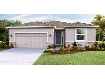 Single-story home with attached garage, landscaping, and neutral color palette at 10818 Patoka Ter, Parrish, FL 34219