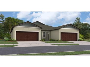 Two-car garage, two-story home with neutral exterior and landscaping at 12661 Lily Quartz Loop, Parrish, FL 34219