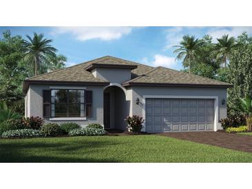 One-story home with gray siding, brown roof, and a two-car garage at 16000 Honeysuckle St, Port Charlotte, FL 33953
