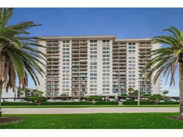 High rise building exterior, offering many windows and parking at 400 Island Way # 309, Clearwater Beach, FL 33767
