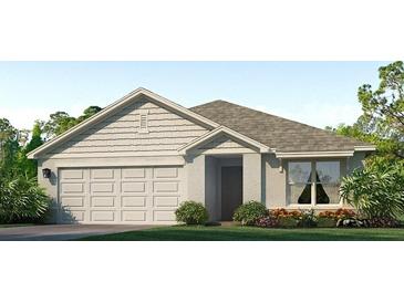 One-story home with a light beige exterior, gray roof, and landscaped front yard at 6123 Distant Haze Pl, Palmetto, FL 34221
