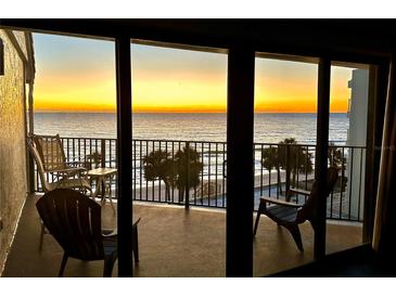 Breathtaking sunset view from balcony overlooking the ocean at 16330 Gulf Blvd # 306, Redington Beach, FL 33708