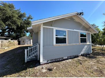 Gray house with a shed and yard at 2126 43Rd N Ave, St Petersburg, FL 33714