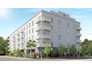 Modern apartment building with multiple balconies and landscaped grounds at 600 3Rd S Ave # 404, St Petersburg, FL 33701