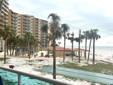 Stunning beachfront view with beach access and pier at 880 Mandalay Ave # N111, Clearwater Beach, FL 33767