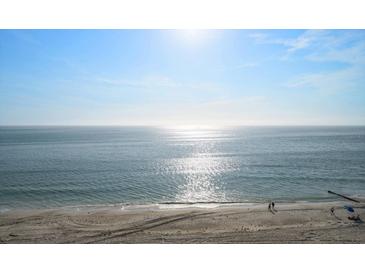 Stunning ocean view from the beach with a clear blue sky at 15462 Gulf Blvd # 603, Madeira Beach, FL 33708