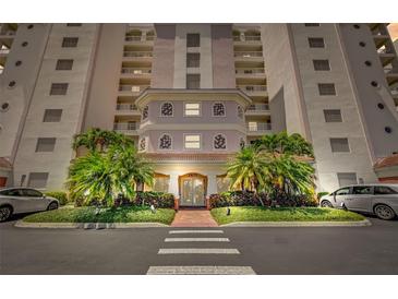 Stunning condo building entrance with lush landscaping and easy street access at 2825 Terra Ceia Bay Blvd # 1504, Palmetto, FL 34221