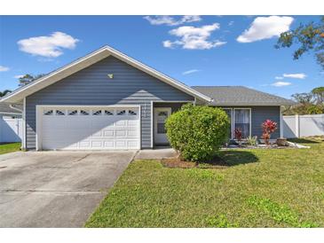 Charming single-story home with a well-maintained lawn and a two car garage in a quiet neighborhood at 9942 56Th Way, Pinellas Park, FL 33782