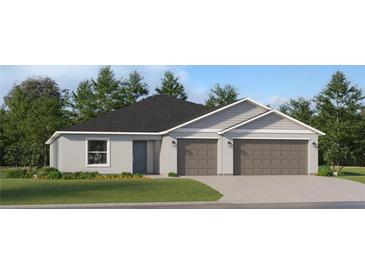 Two-story house with neutral siding, brown garage doors, and landscaping at 10236 Alder Green Dr, Riverview, FL 33578