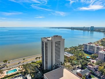 Aerial view of a high-rise building with water and city views at 2413 Bayshore Blvd # 1004, Tampa, FL 33629