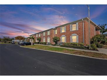 Brick building exterior at sunset with parking at 3824 37Th S St # 67, St Petersburg, FL 33711