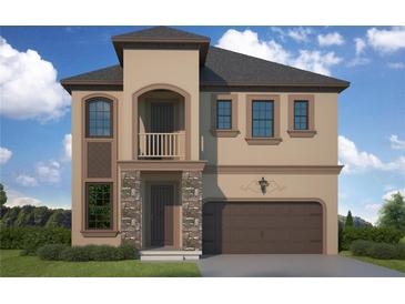 Elegant two-story home featuring a stone facade, covered balcony, and two-car garage at 3022 W Cass St, Tampa, FL 33609