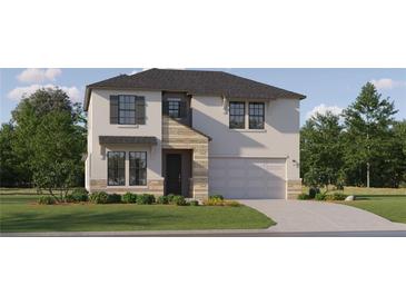 Two-story home with stone accents and a landscaped lawn at 18429 Serene Lake Loop, Lutz, FL 33548