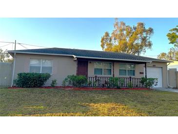 Charming single-story home with a well-maintained front yard and inviting front porch at 4790 81St N Ave, Pinellas Park, FL 33781