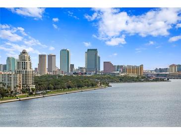 Beautiful cityscape view featuring tall buildings against a blue sky and waterside location at 3301 Bayshore Blvd # 1908B, Tampa, FL 33629