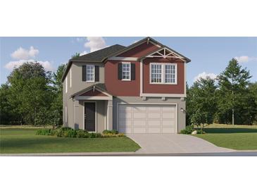 Two-story home with a two-car garage, well-manicured lawn and colorful, eye-catching, neutral paint scheme at 11542 E 71St Ter, Palmetto, FL 34221