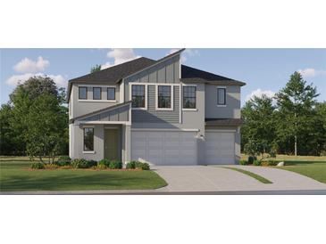 Charming two-story home with a modern architectural design and well-maintained landscaping at 9455 Runaway Breeze Dr, Land O Lakes, FL 34637