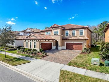 Beautiful two-story home featuring a brick driveway and a tile roof at 4132 Woods Rider Loop, Odessa, FL 33556