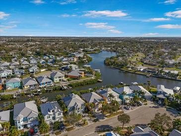 Expansive aerial shot of the Apollo Beach community, showcasing waterfront homes and winding canals at 6411 Grenada Island Ave, Apollo Beach, FL 33572