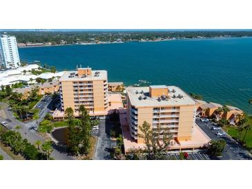 Aerial view of the waterfront condos showcasing beautiful landscaping and coastal views at 7432 Sunshine Skyway S Ln # 206, St Petersburg, FL 33711