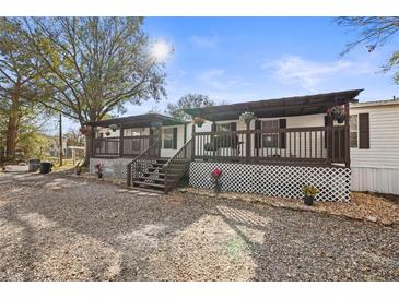 Charming single-story home featuring a spacious front porch, perfect for enjoying the outdoors at 3307 Fox Ridge Blvd, Wesley Chapel, FL 33543