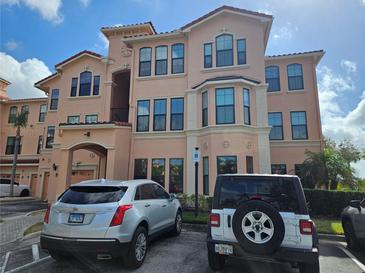 Charming multi-story building with classic Mediterranean architectural details and ample parking spaces at 2755 Via Capri Dr # 1215, Clearwater, FL 33764