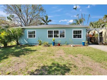 Cozy one-story home featuring bright, natural light from surrounding windows at 2661 45Th S St, Gulfport, FL 33711