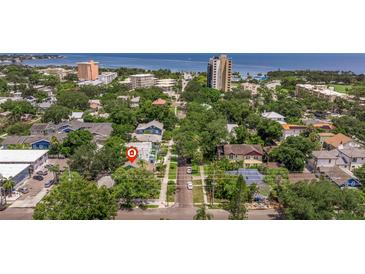 Aerial view showing home's location in a residential neighborhood near the water at 407 10Th Ne Ave, St Petersburg, FL 33701