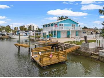 Charming waterfront home with private dock and boat lift at 13822 Judy Ave, Hudson, FL 34667