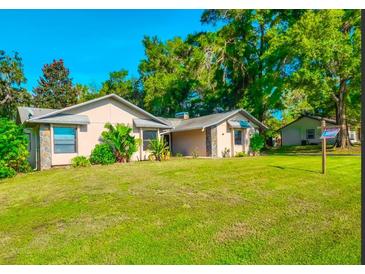 Ranch style home with a large yard at 10190 Thayer St, Brooksville, FL 34601