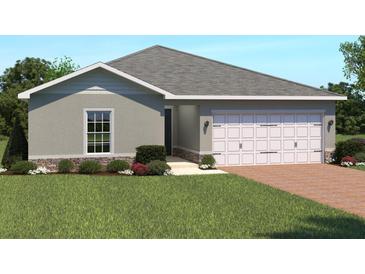 Charming one-story home featuring a two-car garage and well-manicured landscaping at 621 171St E St, Bradenton, FL 34212