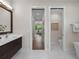 Bathroom hallway leading to other rooms at 11826 River Shores Trl, Parrish, FL 34219
