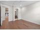 Bright bedroom with wood floors and access to a full bathroom at 11826 River Shores Trl, Parrish, FL 34219