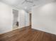Bedroom with hardwood floors and access to bathroom at 11826 River Shores Trl, Parrish, FL 34219