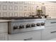 Stainless steel gas cooktop with six burners and modern design at 11826 River Shores Trl, Parrish, FL 34219