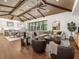 Open living space with hardwood floors, vaulted ceilings, and comfortable seating at 11826 River Shores Trl, Parrish, FL 34219