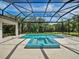 Relaxing pool and spa area with a screened enclosure at 11826 River Shores Trl, Parrish, FL 34219
