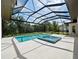 Inviting pool and spa with screened enclosure at 11826 River Shores Trl, Parrish, FL 34219