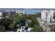 Aerial view showcasing the neighborhood with glimpses of the water and nearby buildings at 304 15Th W St, Bradenton, FL 34205