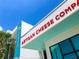 Artisan Cheese Company building; modern, white and teal exterior at 430 Kumquat Ct # 310, Sarasota, FL 34236