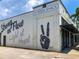 Yoga Shack storefront with inspirational mural at 430 Kumquat Ct # 310, Sarasota, FL 34236