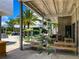 Outdoor patio area with seating and plants at 430 Kumquat Ct # 310, Sarasota, FL 34236