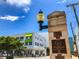 Rosemary District sign, modern white building, and street lamp at 430 Kumquat Ct # 310, Sarasota, FL 34236