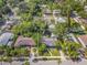 Aerial view of a single-Gathering home with a pool and lush landscaping at 512 1St E Ave, Bradenton, FL 34208