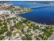 Aerial view showing a house's location near water and bridges at 512 1St E Ave, Bradenton, FL 34208