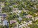 Aerial view of a house with a pool in a residential area at 512 1St E Ave, Bradenton, FL 34208