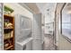 Stackable washer and dryer in laundry closet at 1532 46Th Avenue E Dr, Ellenton, FL 34222