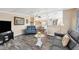 Relaxing living room, gray couches, glass coffee table at 1532 46Th Avenue E Dr, Ellenton, FL 34222