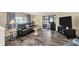 Living room with sliding doors leading to lanai at 1532 46Th Avenue E Dr, Ellenton, FL 34222